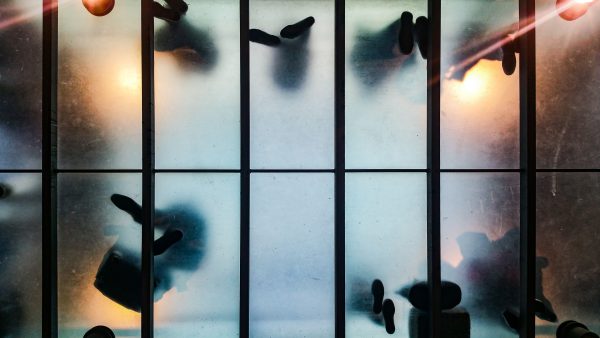 low-angle-view-people-standing-transparent-floor